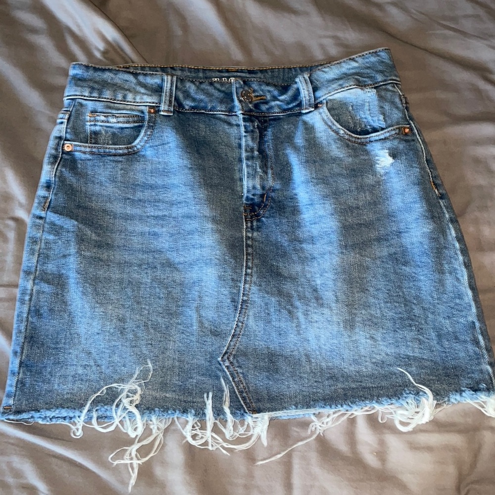 Denim distressed mini skirt